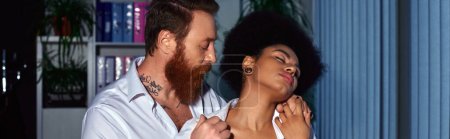 tattooed bearded businessman seducing african american secretary with closed eyes in office, banner