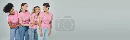 multicultural women different age smiling on grey backdrop, support, breast cancer awareness, banner
