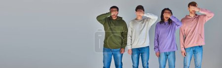 Photo for Four friends in casual trendy outfits covering eyes with palms, cultural diversity, banner - Royalty Free Image
