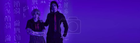 Photo for Anime style students in uniform and wigs in blue neon light with hieroglyphs projection, banner - Royalty Free Image