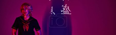 cosplay woman in school uniform sticking out tongue in neon light on purple with hieroglyphs, banner