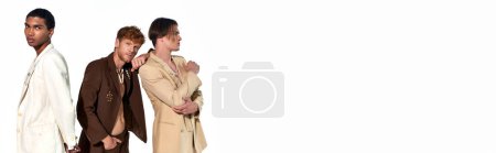 Photo for Tempting elegant male models in unbuttoned suits with accessories posing actively, men power, banner - Royalty Free Image