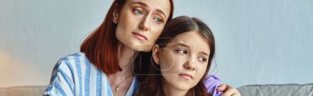 Photo for Worried mother embracing and calming upset teenage daughter at home, support and care, banner - Royalty Free Image