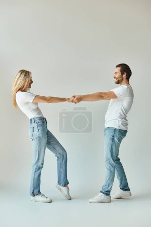 Photo for Happy couple shares a romantic moment as they interlock hands, showcasing their deep connection and affection for each other. - Royalty Free Image