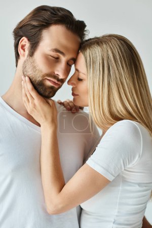 A passionate man and woman entwined in a loving embrace, expressing their deep connection.