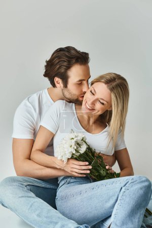 A passionate couple, symbolizing romance, sitting amongst vibrant flowers, sharing intimate moments together