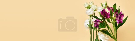 object photo of fresh blooming lilies and eustoma flowers on pastel yellow background, banner