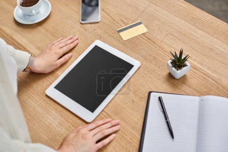 Photo for A businesswoman in a modern office, immersed in her tablet, seizing opportunities in the franchise concept. - Royalty Free Image
