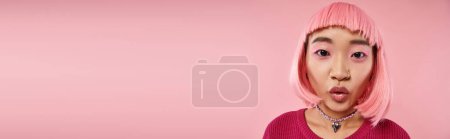 Photo for Horizontal view charming asian young woman with nose piercing surprising and looking to camera - Royalty Free Image