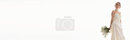 Photo for Banner of young asian woman in luxury white dress looking to side with bouquet of flowers - Royalty Free Image