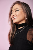 happy brown hair young woman with heavy makeup laughing against lilac background Poster #698337982