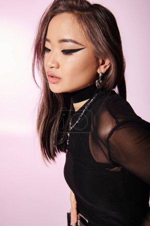 charming asian woman in 20s with heavy makeup looking to back against lilac background mug #698338076