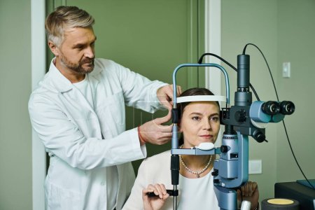 Bearded doctor checking his female patient vision.