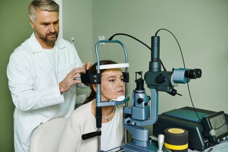Handsome doctor examining a womans eye in a professional setting.