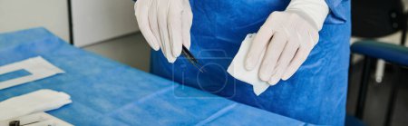 Photo for A person in white gloves holds medical tool. - Royalty Free Image