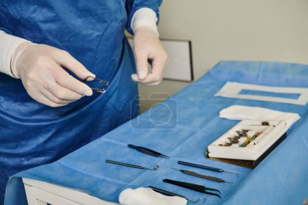 Photo for Devoted doctor using his medical tools. - Royalty Free Image