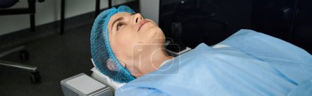 Photo for A man peacefully rests in a hospital bed, donning a blue scrub hat. - Royalty Free Image