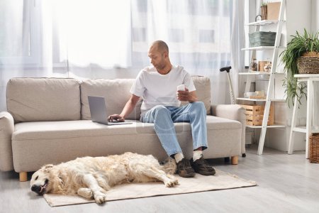 An African American man, living with myasthenia gravis, sits with his loyal Labrador dog on a cozy couch at home.