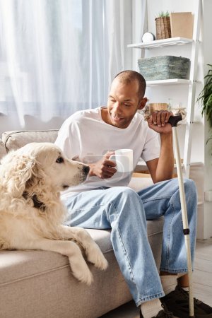 An African American man with myasthenia gravis sits next to his loyal Labrador dog on a comfy couch, enjoying a moment of peace and companionship.