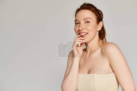 Elegant woman in strapless bra with happiness.