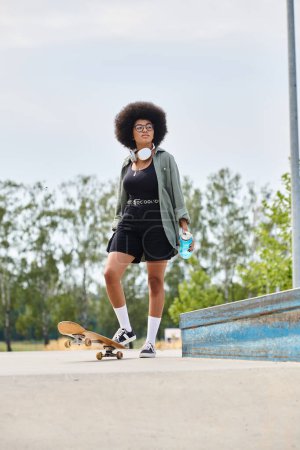 A young African American woman with an afro skillfully skateboards at a vibrant outdoor skate park.