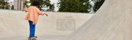 Photo for Young African American woman with curly hair skateboarding at a bustling skate park, showing off impressive skills and tricks. - Royalty Free Image