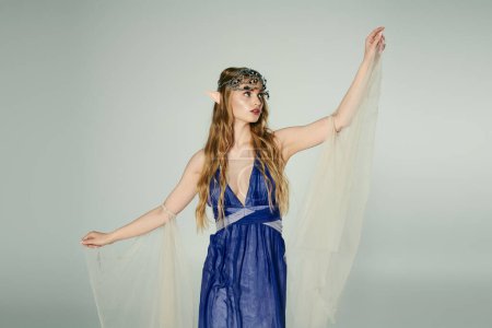 Una joven vestida con un vestido azul fluido y un delicado velo, encarnando la esencia de una princesa elfa mística.