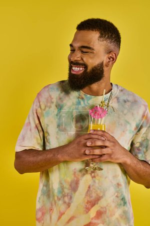 A man with a lush beard holds a delicate flower in his hand, showcasing a harmonious blend of masculinity and nature.
