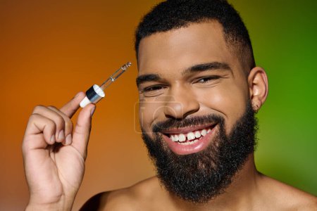 Photo for African american young man holds serum. - Royalty Free Image