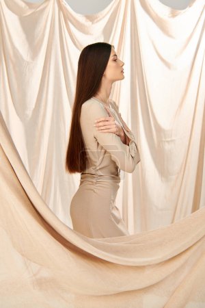 A young woman with long brunette hair posing in a summer outfit in a studio setting, captured in a moment exuding a summer mood.