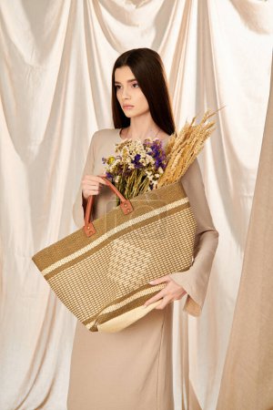 A young woman with long brunette hair joyfully holds a basket overflowing with vibrant flowers, embodying a summer mood.