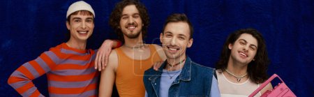 four jolly handsome stylish gay men in casual outfits posing with tape recorder, pride month, banner