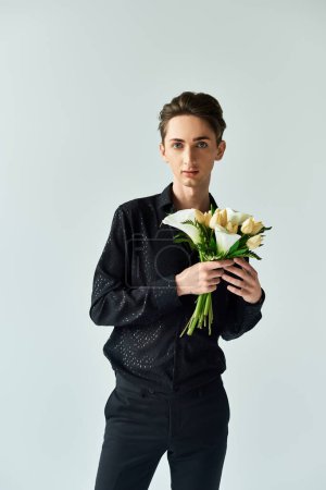 A young queer person stands confidently, holding a vibrant bouquet of flowers, celebrating love, diversity, and pride.