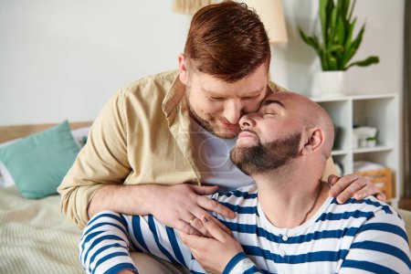 A man warmly kisses another man on the cheek.
