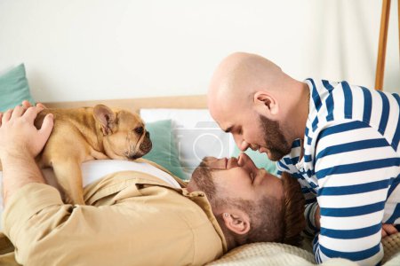 Two men and a dog peacefully lay together on a bed.