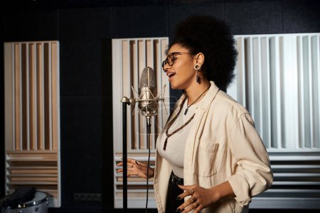 Talented woman belting out tunes in a recording studio surrounded by musical instruments and equipment.