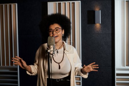A talented woman pours her soul into a microphone, creating music in a recording studio during a band rehearsal.