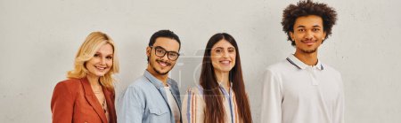 Photo for Group of diverse people standing gracefully in front of white backdrop. - Royalty Free Image