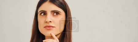Photo for A woman posing and looking away. - Royalty Free Image