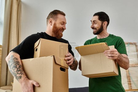 A gay couple holds boxes in their new home, symbolizing a fresh start filled with love and possibility.