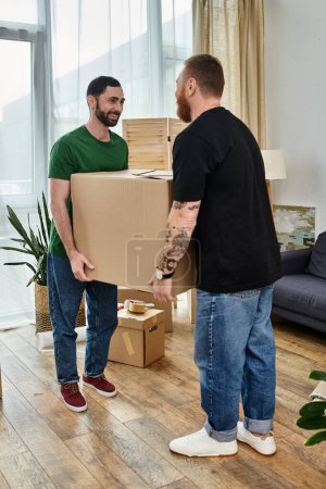 Gay couple in love, surrounded by boxes, savor the moment as they stand next to each other in their new living room.