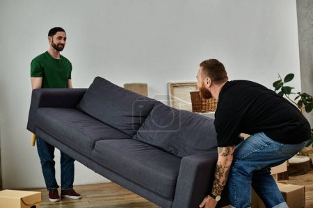 Gay couple happily moves sofa in new living room, starting fresh in new home.