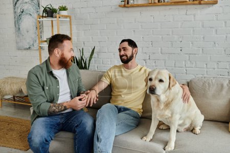 Two bearded men, a gay couple, on a couch with their labrador dog in a cozy living room setting, marriage proposal