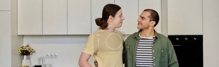 Una joven pareja gay comparte un momento en su cocina moderna, disfrutando de una conversación tranquila en su acogedor apartamento.