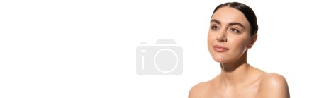 dreamy woman with naked shoulders looking away isolated on white, banner 
