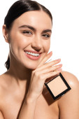 happy young woman with bare shoulders holding neutral beige face powder isolated on white  magic mug #642938276