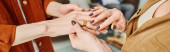 cropped view of mother touching hand of engaged son with wedding ring, banner mug #653456558