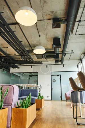 waiting area in modern coworking office, soft and comfortable couch, high table and chairs, green and natural decorative plants, high tech interior, workspace organization concept