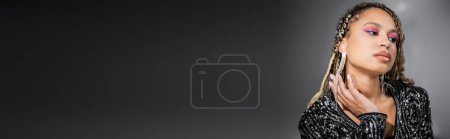 Photo for Banner, beautiful african american woman with bold makeup on grey background, party, looking away - Royalty Free Image