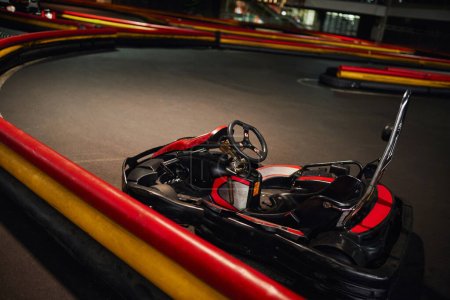 Photo for Go kart, car for racing or red racing, inside of indoor kart circuit, motor race vehicle - Royalty Free Image